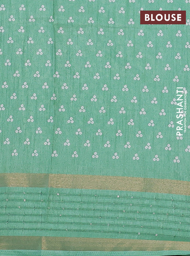 Semi dola saree pastel green with allover bandhani prints and zari woven border
