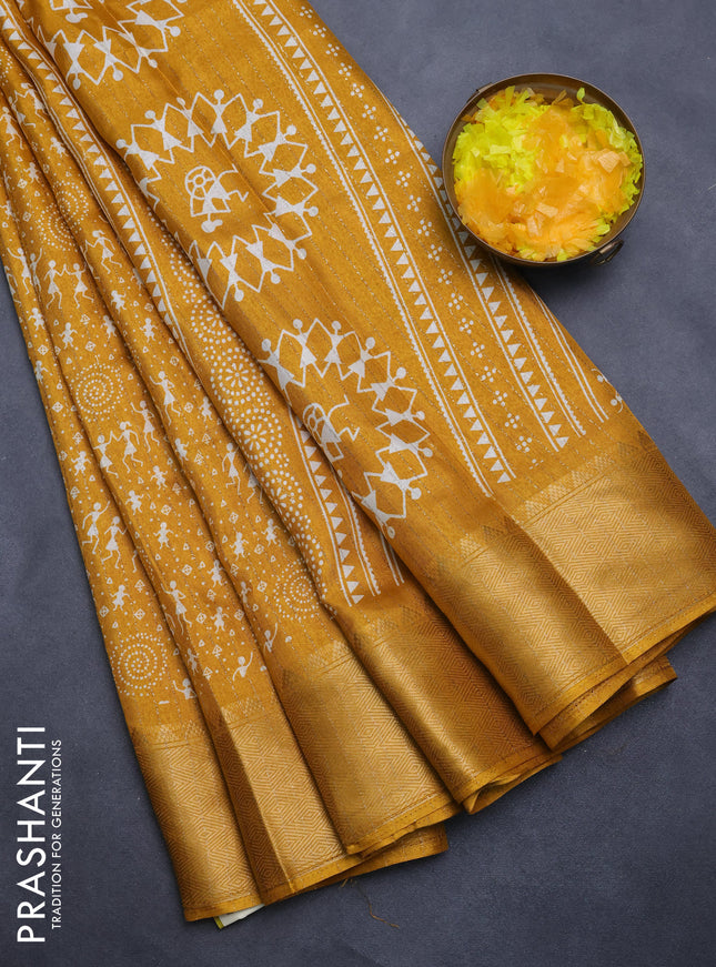 Semi dola saree mustard yellow with allover warli prints & zari weaves and zari woven border