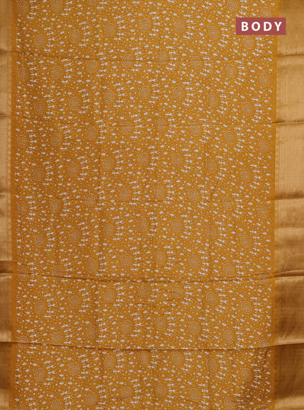 Semi dola saree mustard yellow with allover warli prints & zari weaves and zari woven border