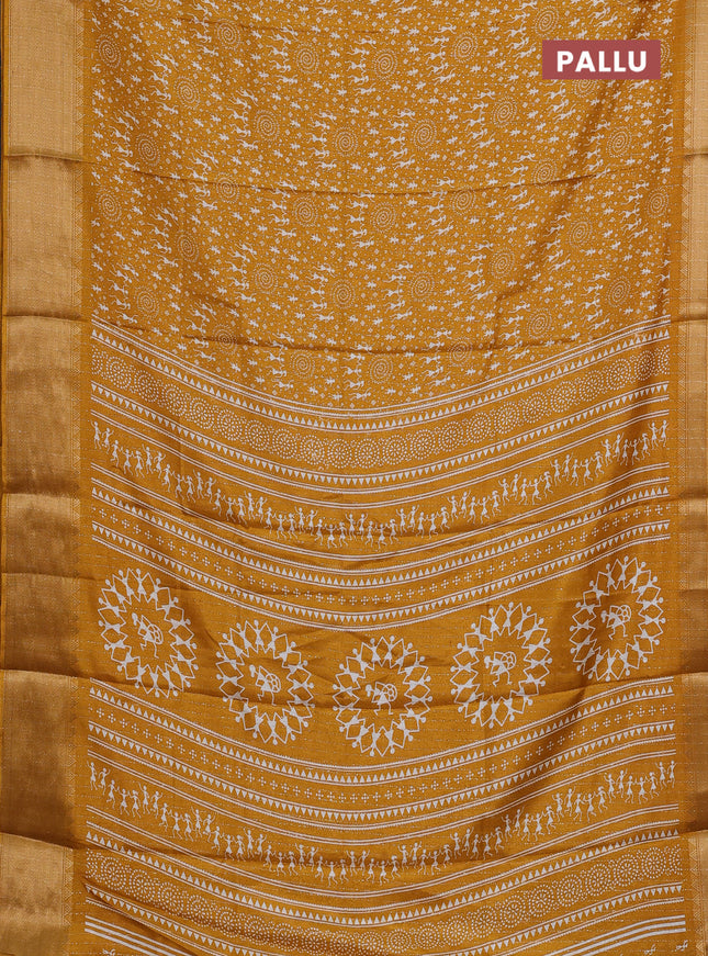 Semi dola saree mustard yellow with allover warli prints & zari weaves and zari woven border