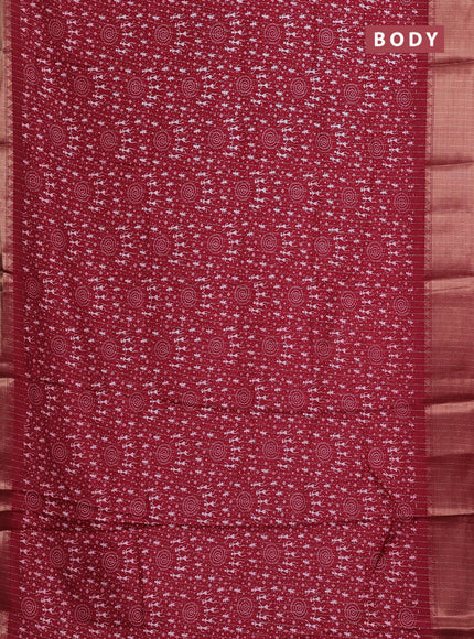 Semi dola saree maroon with allover warli prints & zari weaves and zari woven border
