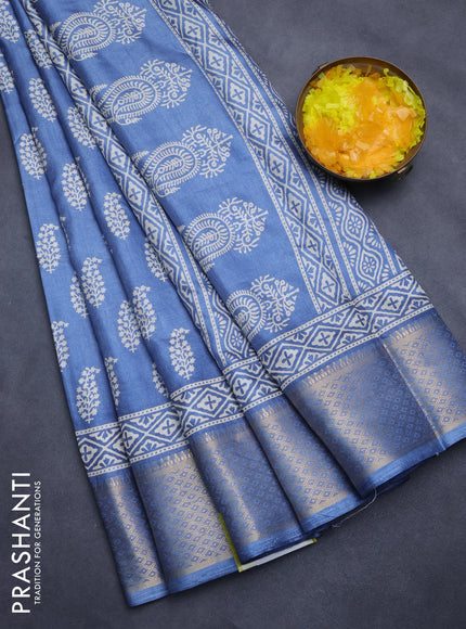 Semi dola saree blue shade with butta prints and zari woven border