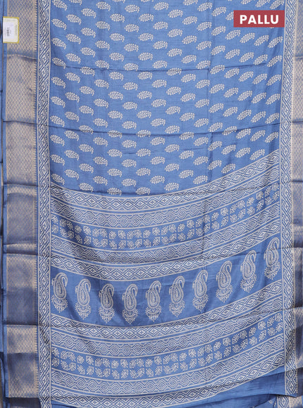 Semi dola saree blue shade with butta prints and zari woven border