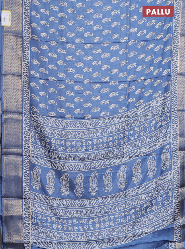 Semi dola saree blue shade with butta prints and zari woven border