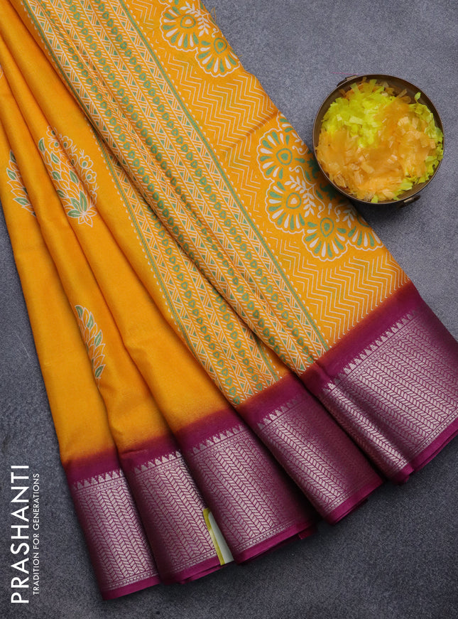 Semi dola saree mango yellow and wine shade with butta prints and zari woven border