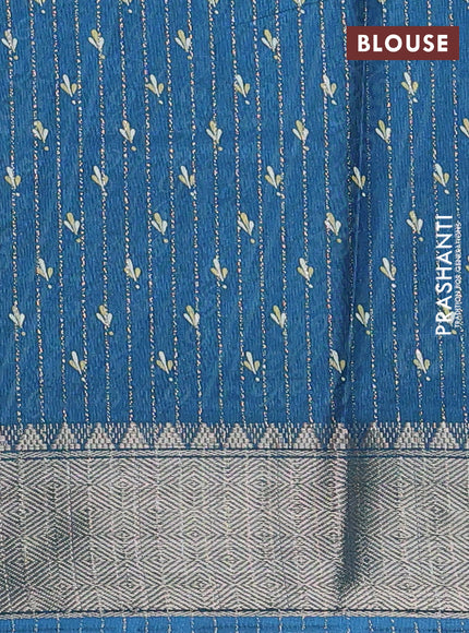 Semi dola saree cs blue with allover zari weaves & leaf prints and zari woven border