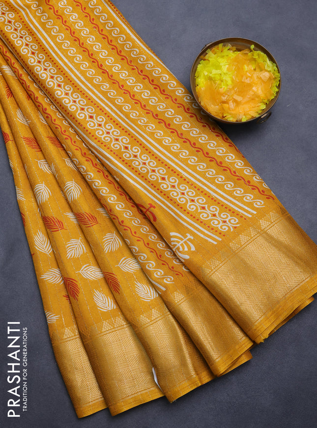 Semi dola saree mustard yellow with allover zari weaves & leaf prints and zari woven border
