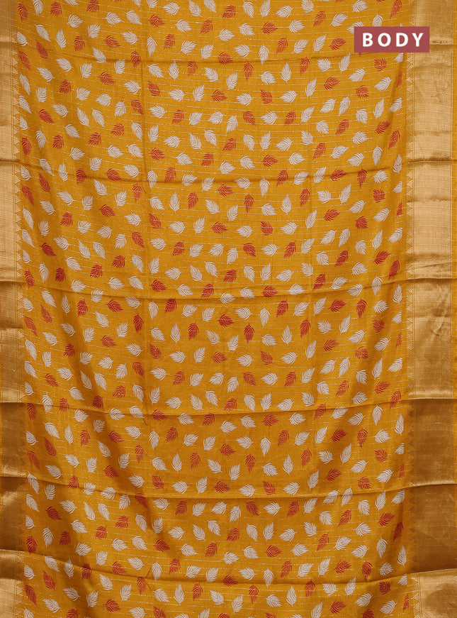 Semi dola saree mustard yellow with allover zari weaves & leaf prints and zari woven border