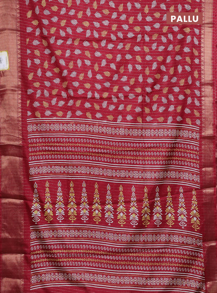 Semi dola saree maroon with allover zari weaves & leaf prints and zari woven border