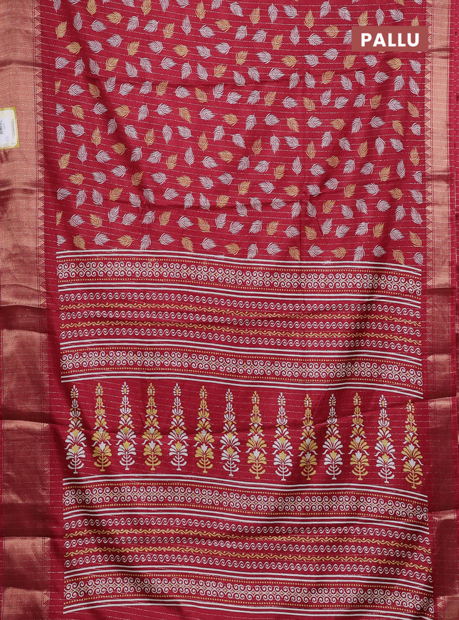 Semi dola saree maroon with allover zari weaves & leaf prints and zari woven border