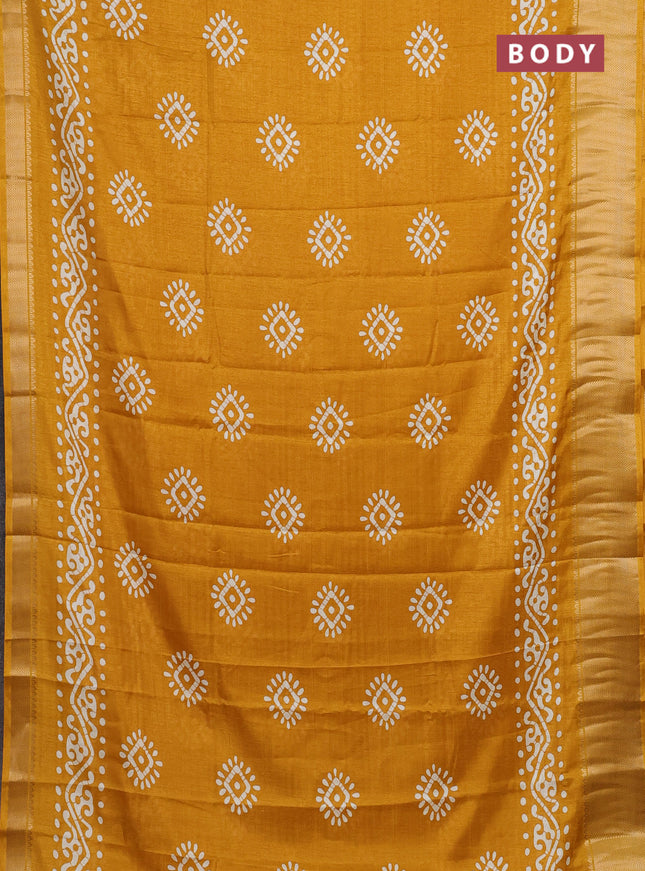Semi dola saree mustard yellow with batik butta prints and zari woven border