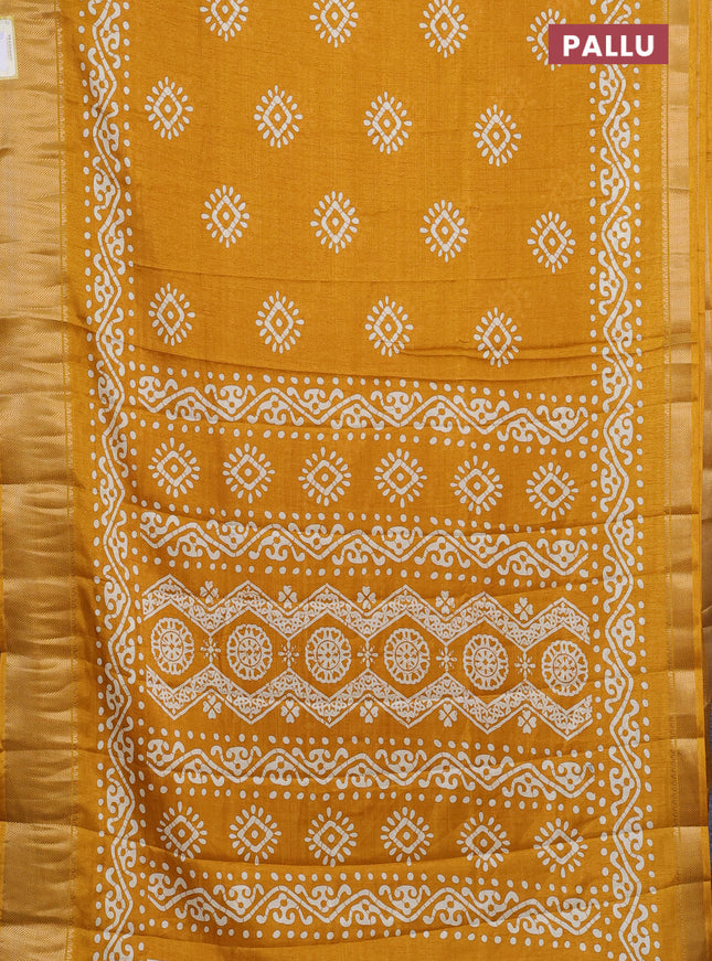 Semi dola saree mustard yellow with batik butta prints and zari woven border