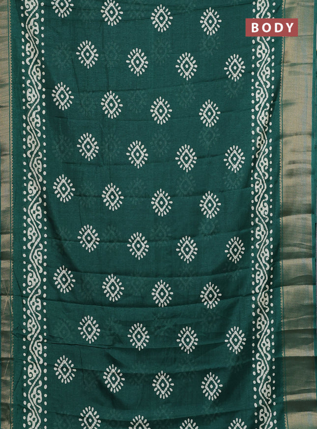 Semi dola saree green with batik butta prints and zari woven border