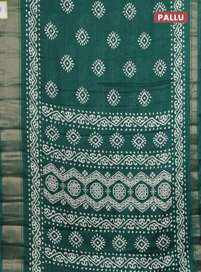 Semi dola saree green with batik butta prints and zari woven border