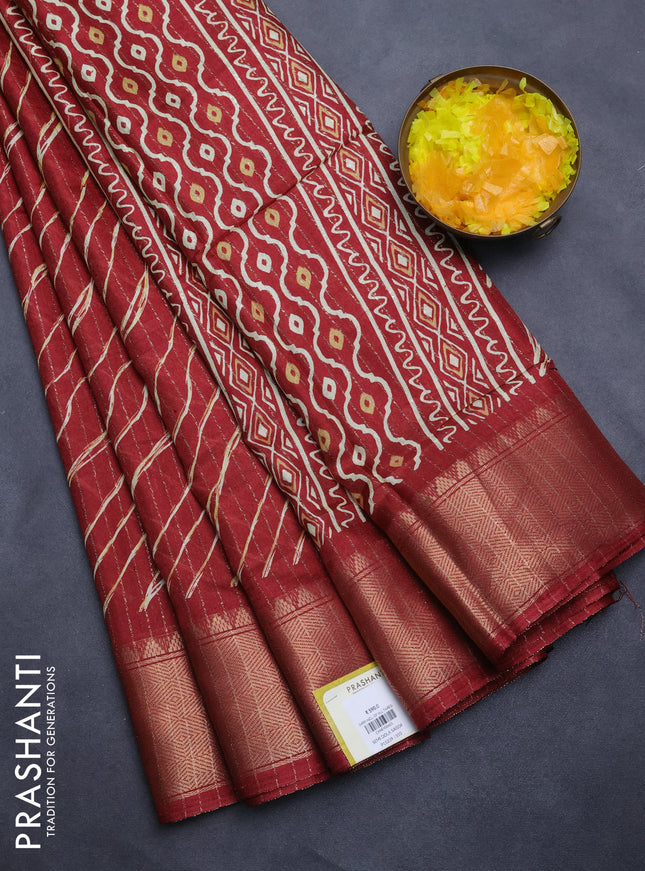 Semi dola saree maroon with allover zari weaves & leheriya prints and zari woven border