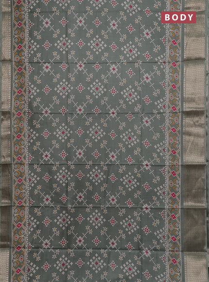 Semi dola saree greyish green with allover prints and zari woven border