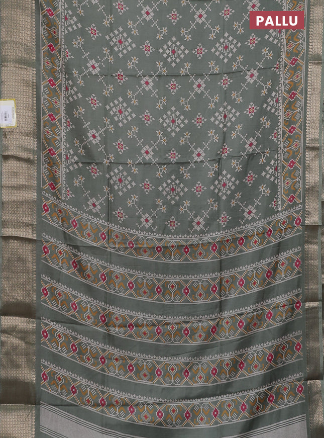 Semi dola saree greyish green with allover prints and zari woven border