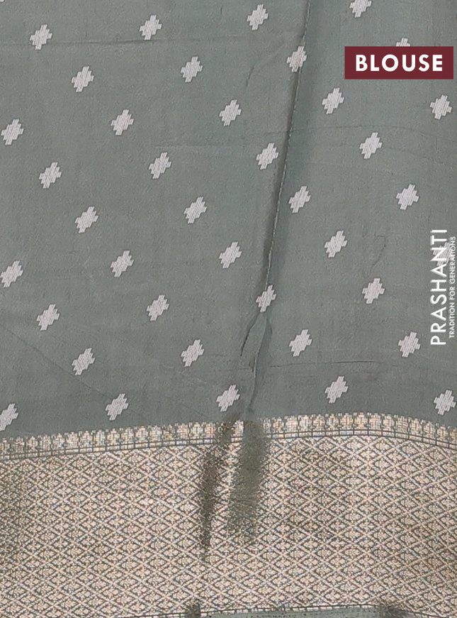 Semi dola saree greyish green with allover prints and zari woven border