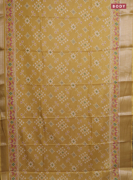 Semi dola saree pale yellow with allover prints and zari woven border