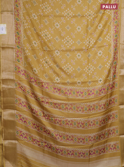Semi dola saree pale yellow with allover prints and zari woven border