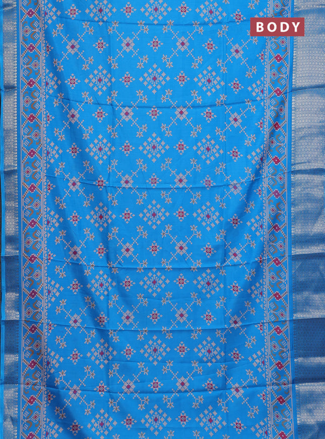 Semi dola saree cs blue with allover prints and zari woven border