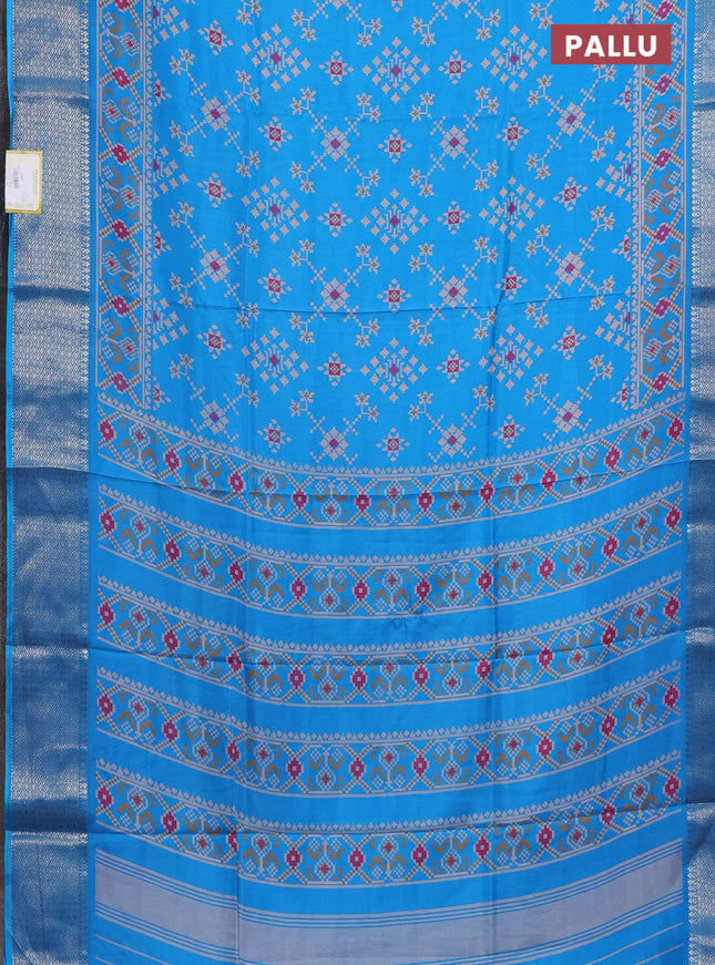 Semi dola saree cs blue with allover prints and zari woven border