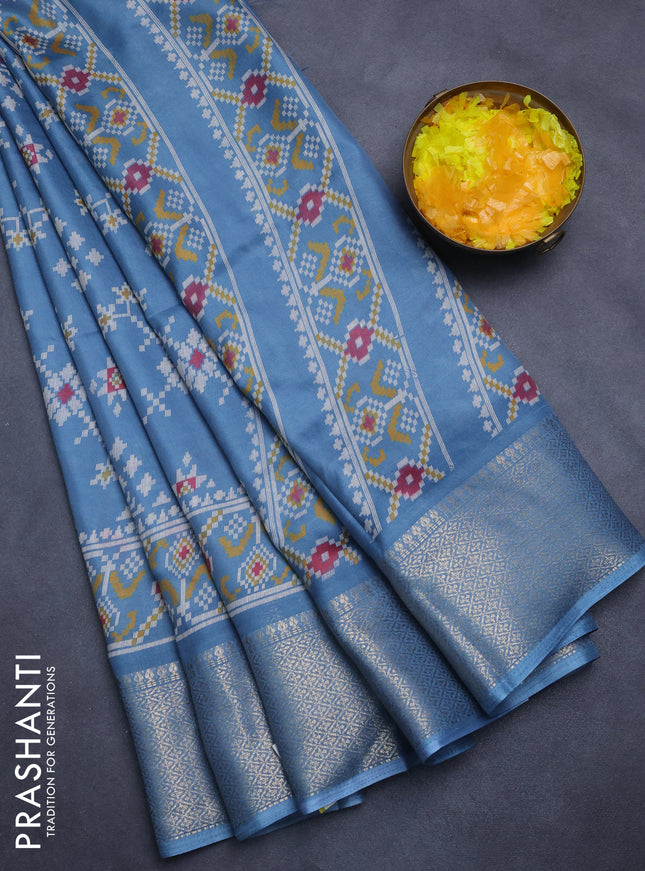 Semi dola saree pastel blue with allover prints and zari woven border