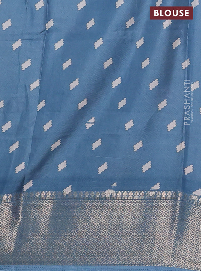 Semi dola saree pastel blue with allover prints and zari woven border