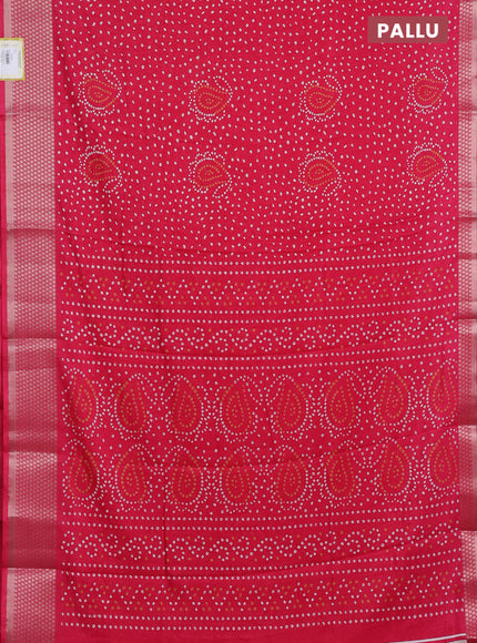 Semi dola saree pink with allover bandhani prints and zari woven border