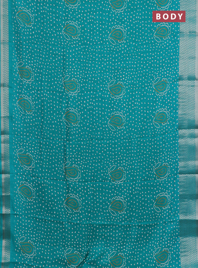 Semi dola saree teal green with allover bandhani prints and zari woven border