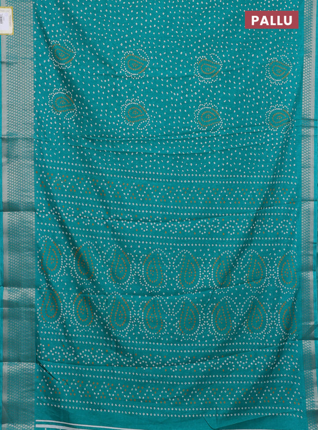 Semi dola saree teal green with allover bandhani prints and zari woven border