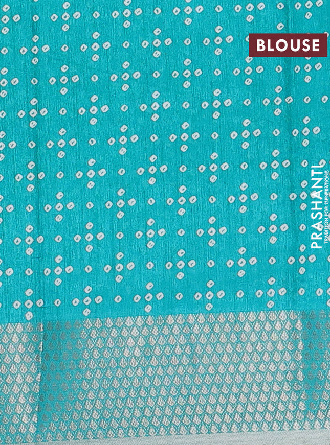Semi dola saree teal green with allover bandhani prints and zari woven border