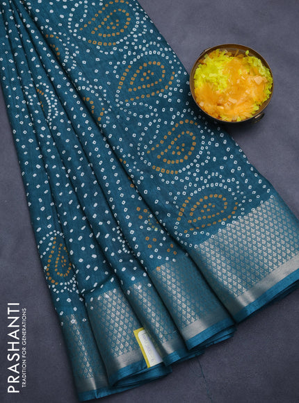 Semi dola saree teal green with allover bandhani prints and zari woven border