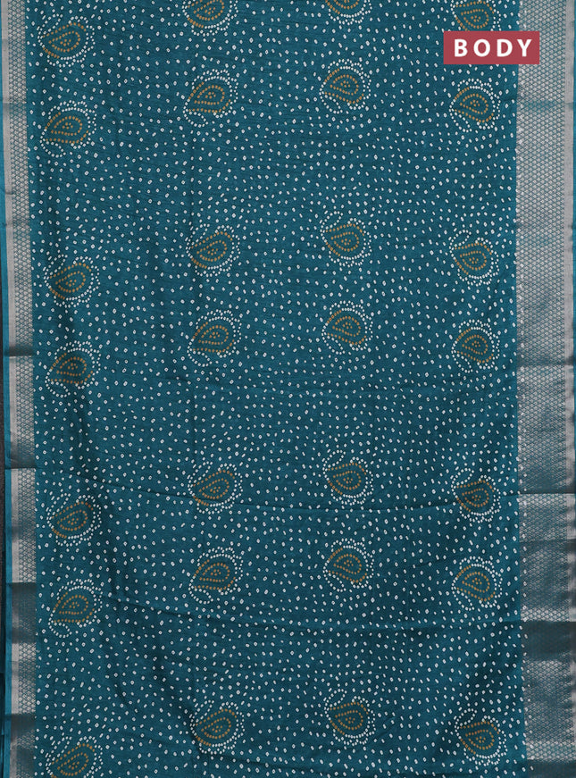 Semi dola saree teal green with allover bandhani prints and zari woven border