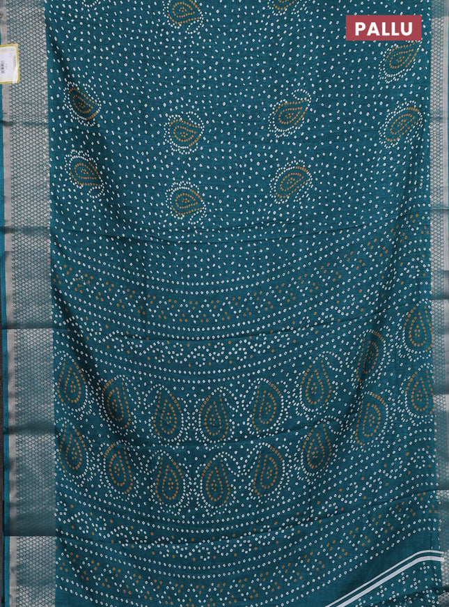 Semi dola saree teal green with allover bandhani prints and zari woven border