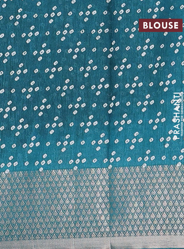 Semi dola saree teal green with allover bandhani prints and zari woven border