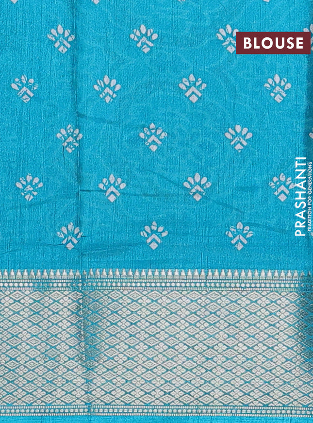 Semi dola saree grey and teal blue with allover floral prints and zari woven border