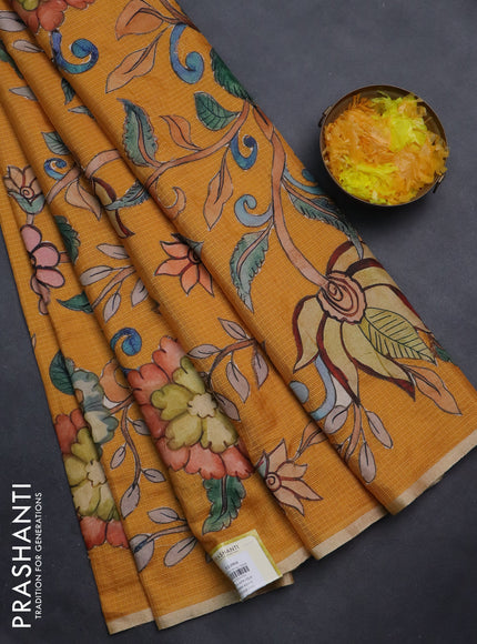 Kota saree mustard yellow with kalamkari applique work and zari woven piping border
