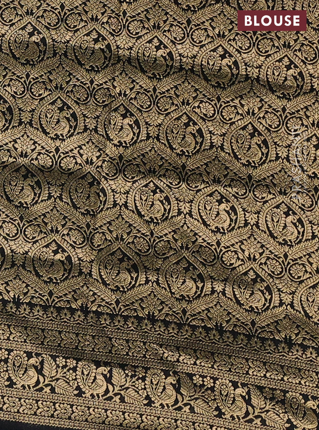 Crepe silk saree black with allover kalamkari prints & embroidery work and zari woven border