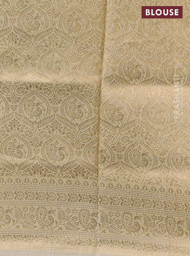 Crepe silk saree cream with allover kalamkari prints & embroidery work and zari woven border