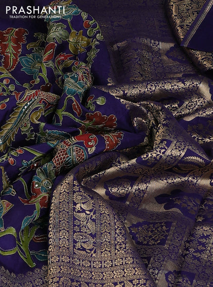 Crepe silk saree blue with allover kalamkari prints & embroidery work and zari woven border