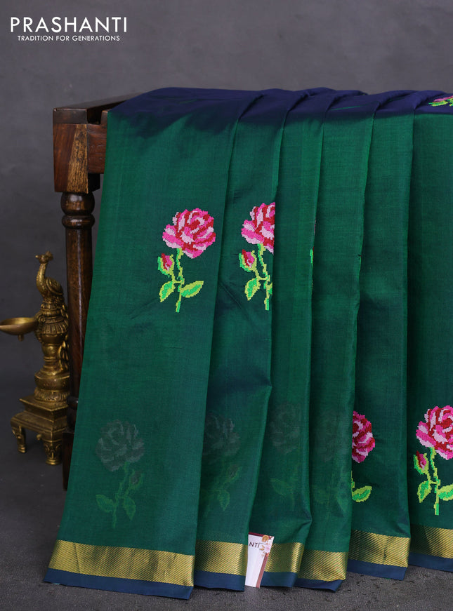 Silk cotton saree green with embroidery buttas and zari woven border