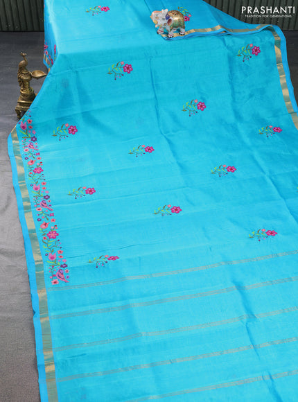 Silk cotton saree teal blue with embroidery buttas and embroidery work border
