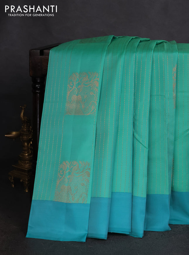 Kanchipuram silk saree teal green shade and teal blue with allover copper zari weaves and simple border