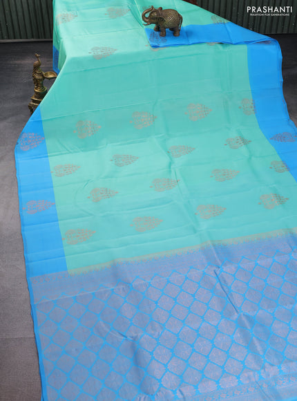 Kanchipuram silk saree teal green shade and blue with copper zari woven buttas and copper zari woven butta border