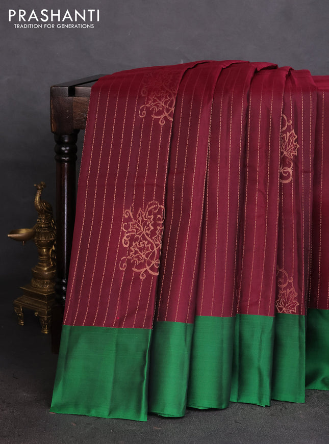 Kanchipuram silk saree dark magenat pink and green with allover copper zari weaves and simple border