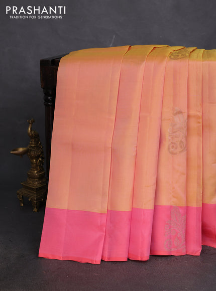 Kanchipuram silk saree dual shade of yellow and peach pink with copper zari woven buttas and copper zari woven butta border