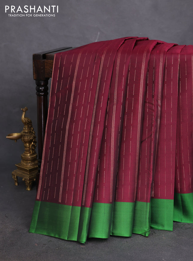Kanchipuram silk saree maroon and green with allover copper zari weaves and simple border