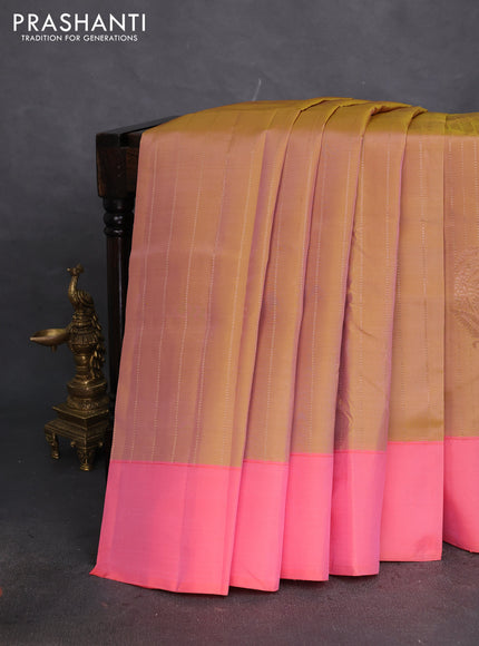 Kanchipuram silk saree dual shade of dark mustard and peach pink with allover copper zari weaves and simple border