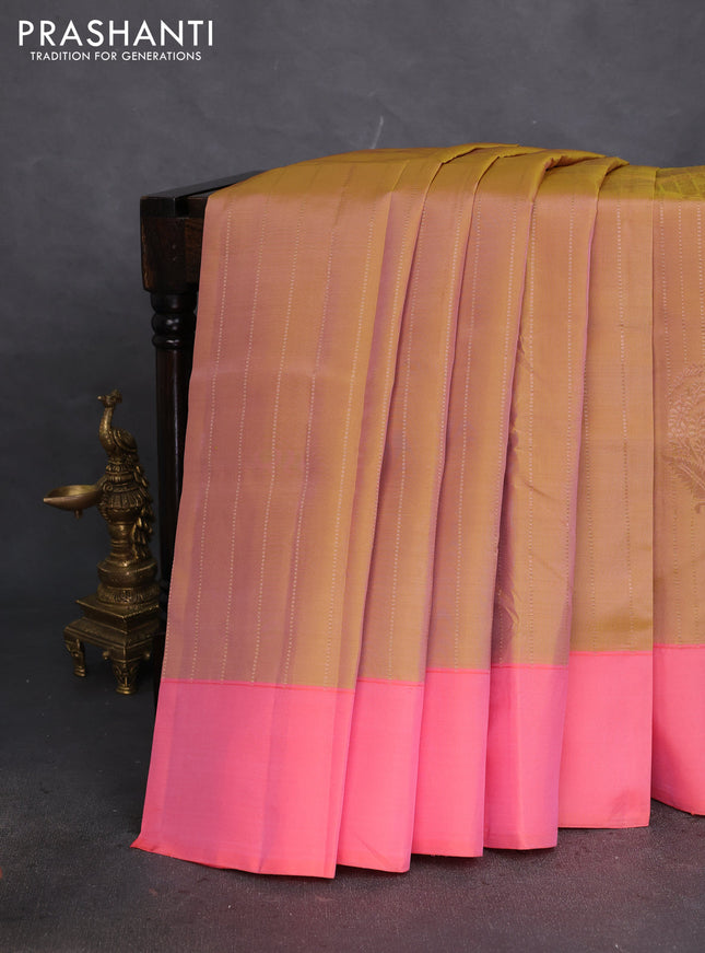 Kanchipuram silk saree dual shade of dark mustard and peach pink with allover copper zari weaves and simple border